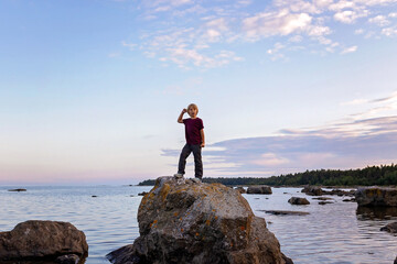 Family, visiting small village Lorudden in Sweden, summertime. Scandinavian coast