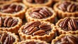 © fotofabrika - Delicious pecan tarts freshly baked and ready to serve on a rustic wooden table during a sunny afternoon gathering