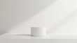 © -Quantum Pixels- - Minimalist 3D scene featuring a realistic white background and a cylinder pedestal ideal for showcasing cosmetics and product displays 3D rendering illustration