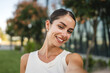 © Miljan Živković - Self portrait of beautiful happy young woman stand in front building
