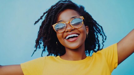 Wall Mural - Happy Woman in Yellow T-shirt with Sunglasses