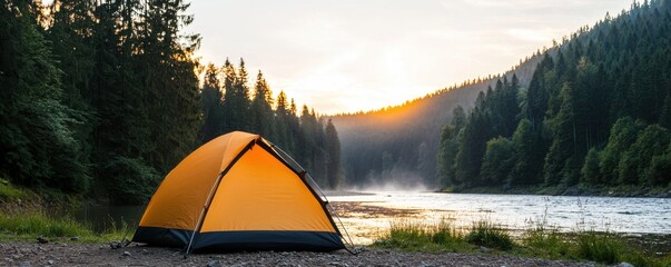 a vibrant orange tent set against a serene river and lush forest at sunset, ideal for nature lovers 