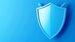 © Tackey - Blue shield symbolizing protection, security, and safety. Vibrant blue background conveys a sense of trust and reliability.