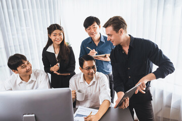 Group of diverse office worker employee working together on strategic business marketing planning in corporate office room. Positive teamwork in business workplace concept. Prudent