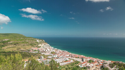 Aerial view on the coastal town of Sesimbra in Portugal timelapse