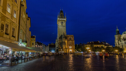 Canvas Print - Prague Old Town Hall at Night timelapse hyperlapse with unrecognizable tourists walking