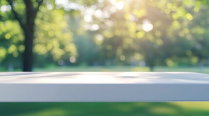 Canvas Print - Blurred Green Nature Background with White Surface