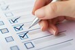 © LidiaLens - Close-up of a hand with a silver pen checking off boxes on a checklist, representing task management, organization, and progress tracking in both personal and professional settings
