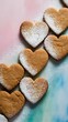 © Pista Hunt - Heart shaped ginger cookies on two tone colored background top view
