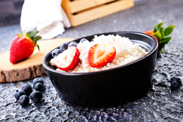 Wall Mural - cottage cheese with fresh berries for a healthy breakfast