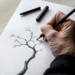 © missisya - Hand Drawing a Tree Branch with Pencil on White Paper