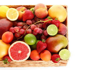 Sticker - Wicker basket with different fresh fruits on white background