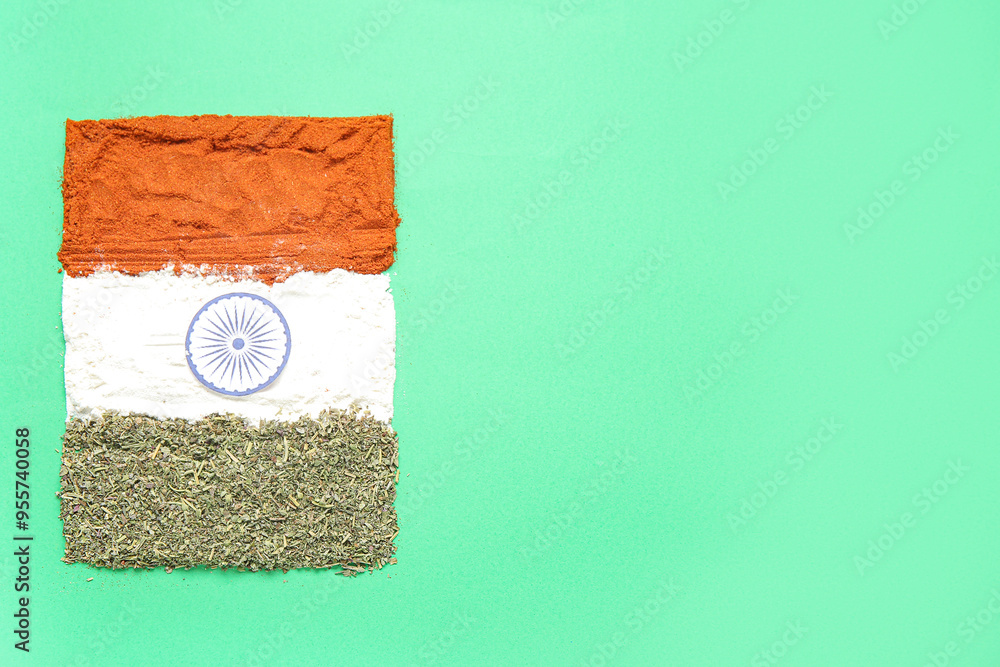 Indian flag made of spices on green background