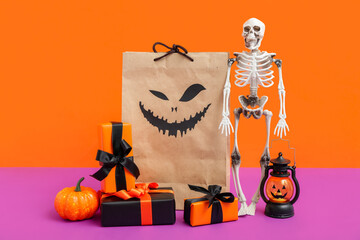 Sticker - Composition with shopping bag, decorations and gifts for Halloween on color background