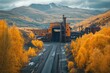 © herman - A high-definition photo of a mining scene in autumn, featuring a long flat beltway with yellow trees
