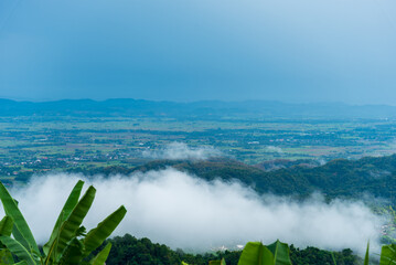 Beautiful Mountain landscape foggy windy mountain range green landscape asian farm. Amazing Landscape mountain green field meadow white cloud blue sky on sunrise. Countryside sunlight heaven scenery