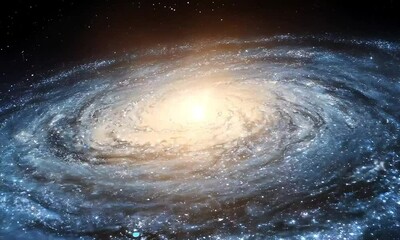 Wall Mural - A stunning spiral galaxy with a brilliant glowing center amidst the cosmos
