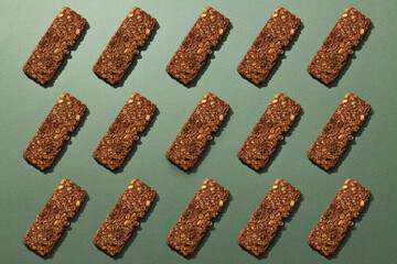 Wall Mural - Tasty granola bar on a dark background