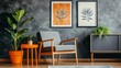 © Togrul - Living room with gray wall posters, wooden chair, orange table with plant