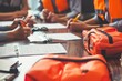 © Shooting Star Std - A crisis management team reviewing a checklist for disaster preparedness. Meeting room with emergency kits and detai