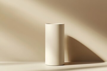 Wall Mural - A minimalist white vase casting soft shadows on a beige surface.