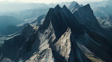 Wall Mural - The drone captures the sharp, jagged peaks of a mountain ridge, with steep cliffs dropping away on either side