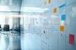 © Paniti - Business plan flowchart on a whiteboard in a conference room, collaborative planning session.