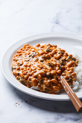 Canvas Print - Creamy tomato bean stew with rice.