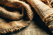 © MaryKovs - Close-Up of Burlap Fabric Showing Natural Fiber Weave and Rustic Texture