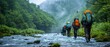 © MochSjamsul - Trekking group of tourists with backpacks on mountain footpath among river forest