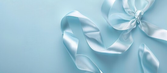 Aufkleber - Top view of a lovely ribbon on a light blue backdrop with copy space image available