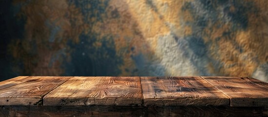 Poster - Wooden table with a blurred wall background offers copy space for product advertising placement