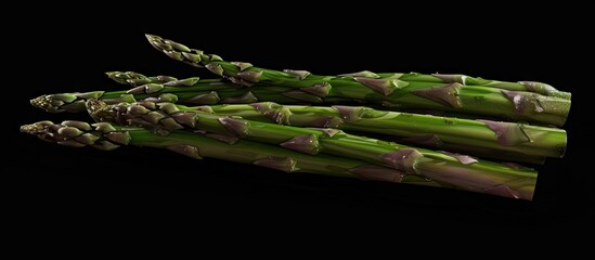 Aufkleber - Fresh natural green asparagus set against a black backdrop ideal for a copy space image showcasing this healthy plant food