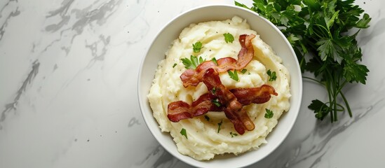 Aufkleber - Top down view of crispy bacon creamy mashed potatoes and fresh parsley on a white marble surface leaving room for a copy space image