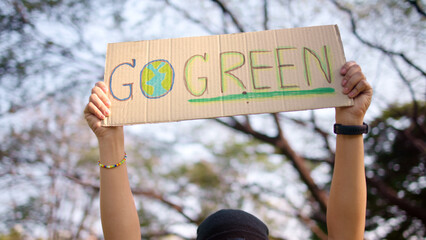 go green people young woman hand raised showing save the earth planet world care banner poster sign 