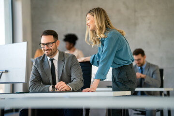 Sticker - Group of multiethnic business people analyzing data using computer while working in the office