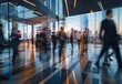 © prarthana - A blur effect of people walking past each other in an office at a very busy time.