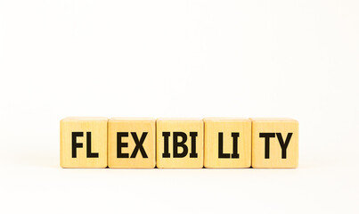 Flexibility symbol. Concept word Flexibility on beautiful wooden blocks. Beautiful white background. Business flexibility concept. Copy space.