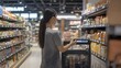 © Apiwat - A future grocery store, where customers shop using smart carts that automatically scan items and AI guides for a personalized experience