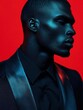 © Fxquadro - Man in black suit with satin lapels on red backdrop
