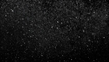 Wall Mural - nocturnal snowfall: textured white grain and dust against black