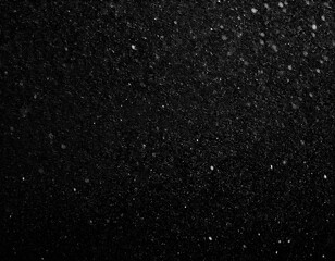 Wall Mural - nocturnal snowfall: textured white grain and dust against black