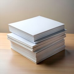 Poster - A neatly stacked pile of blank white paper sheets on a wooden desk.