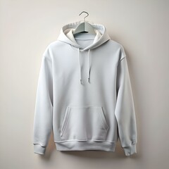 Blank white hoodie mockup hanging on a hanger.