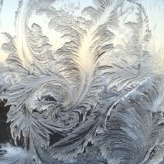 Poster - Intricate frost patterns on a window pane, creating a natural, abstract design with a soft, blurred background.