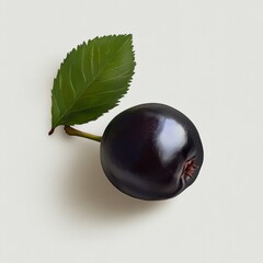 Wall Mural - Single black cherry with a green leaf, isolated on white background.