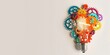 © kwanchaift - Abstract light bulb made of colorful gears, creativity and engineering concept