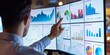 © kwanchaift - A person analyzing customer satisfaction survey trends and patterns on a digital dashboard, making data-driven decisions