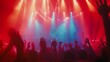 © VK Studio - Enthusiastic audience members with their hands in the air, immersed in the high-energy atmosphere of a live music concert.