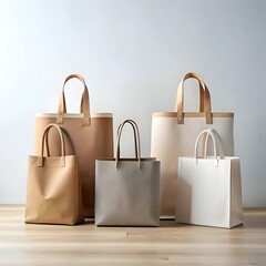 A row of four stylish tote bags in various colors and textures. arranged against a simple backdrop.